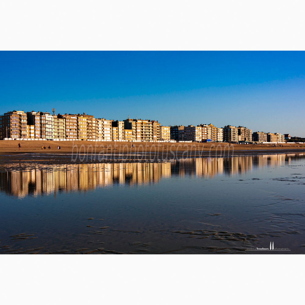 st idesbald north sea - buildings reflected on low tide.jpg