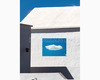 casa imbiancata con finestrella aperta sul cielo a Teguise.jpg